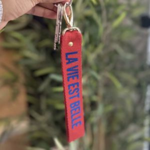 Porte-clés « La vie est belle» rouge