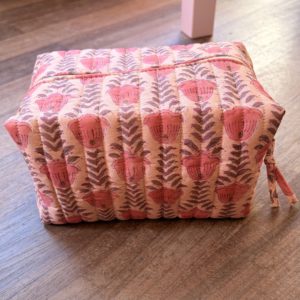 Trousse de toilette imprimé floral sur fond vieux rose